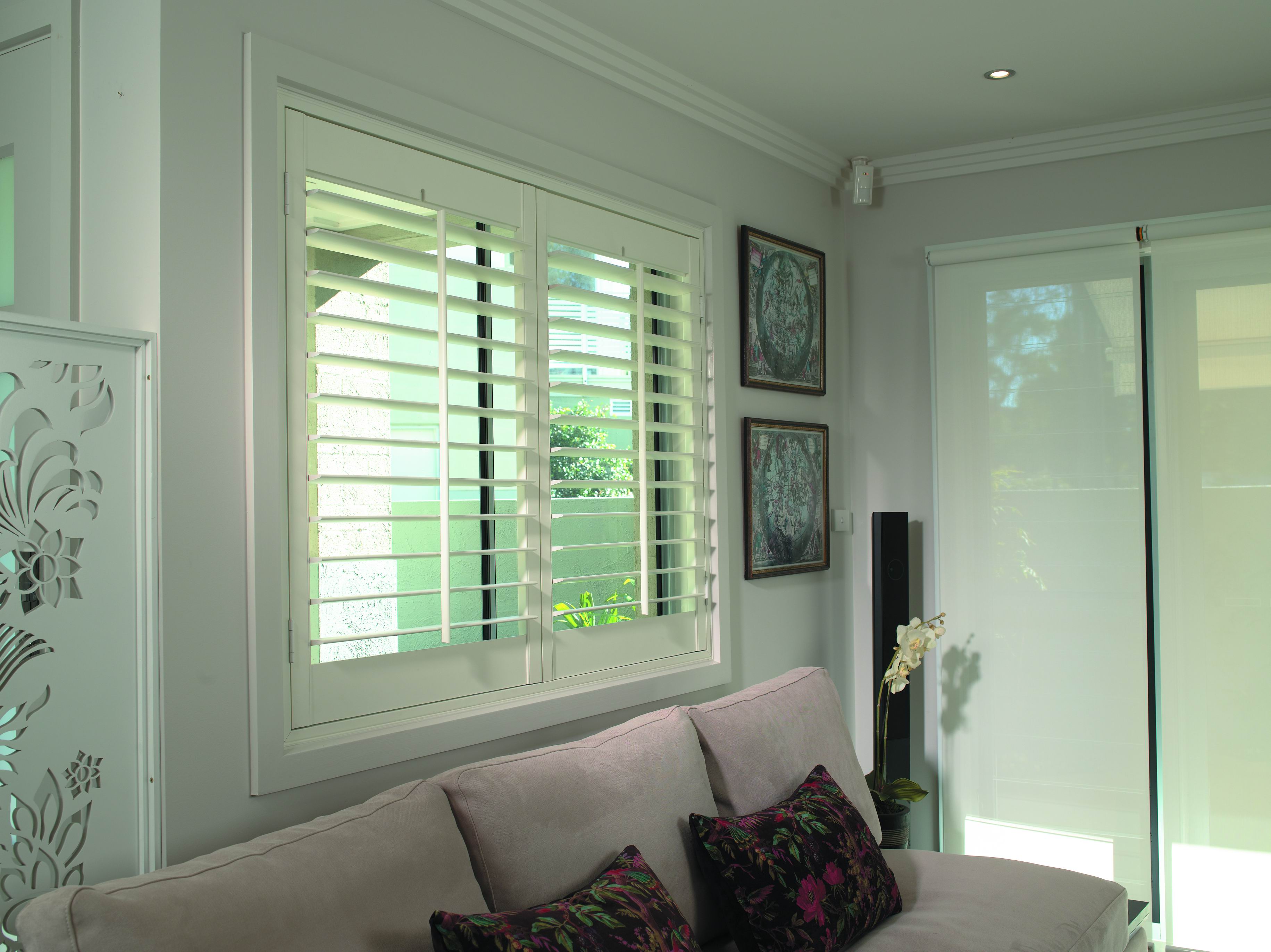 Timber Shutters and Roller Blinds.Jpeg